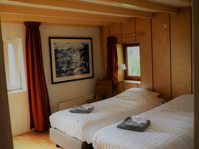 Slaapkamer met uitzicht over het land